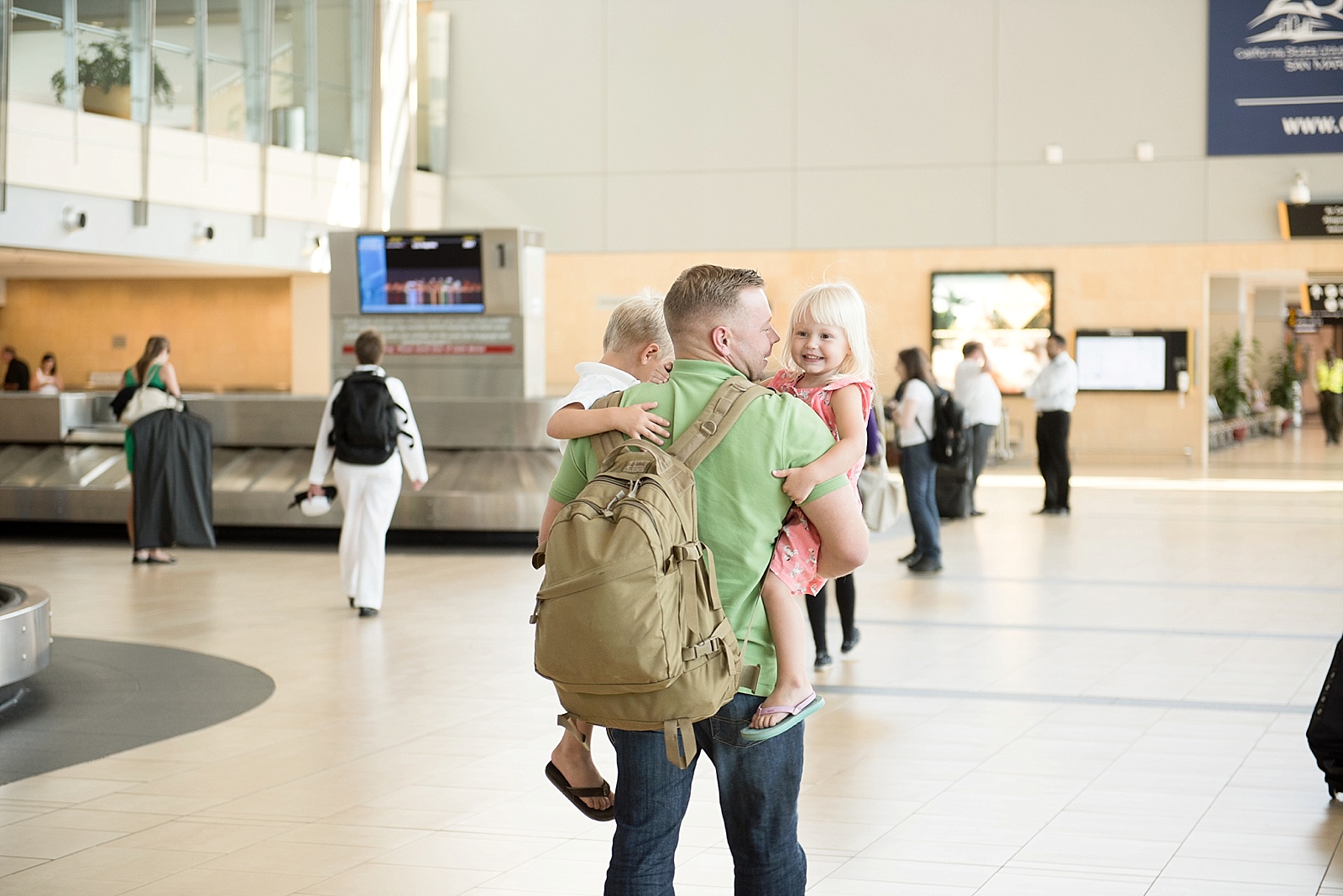 Military deployment Homecoming photography at the San Diego Airport by Lauren Nygard