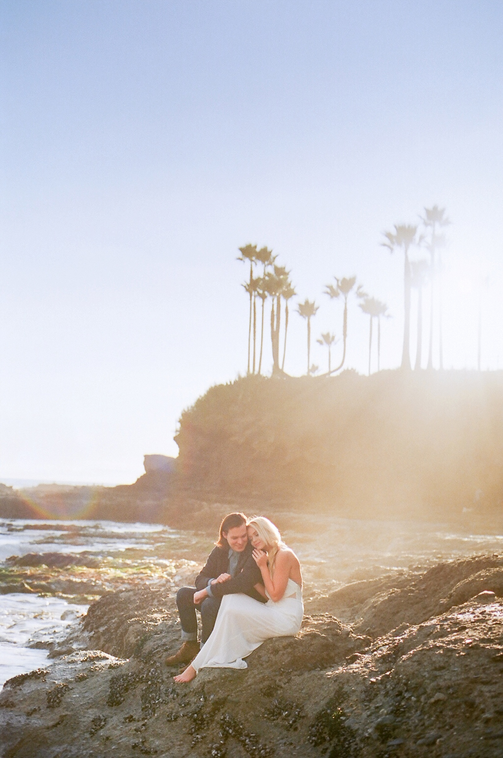 Beach couple's session on film by North Carolina photographer Lauren Nygard