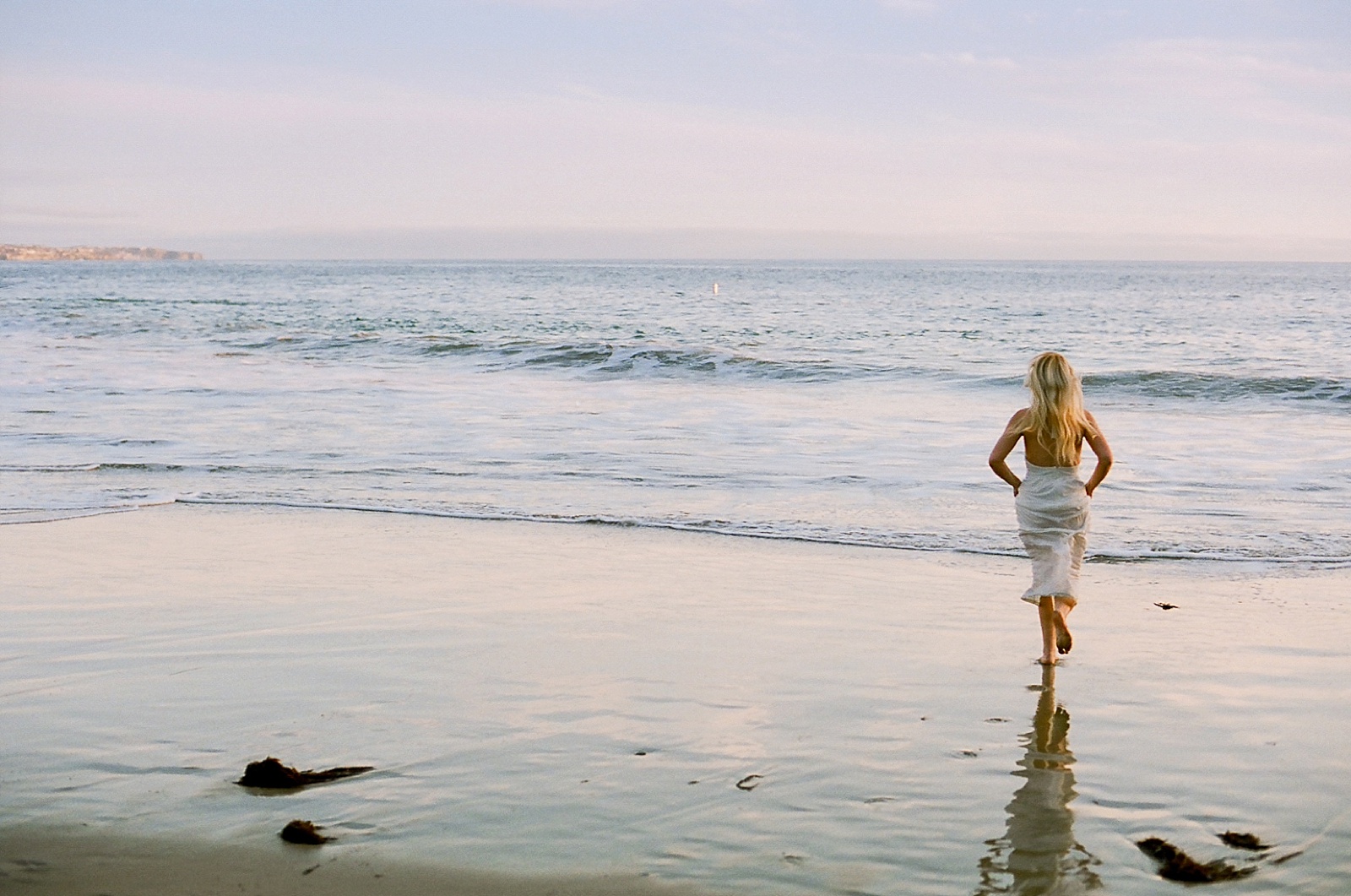 Beach couple's session on film by North Carolina photographer Lauren Nygard