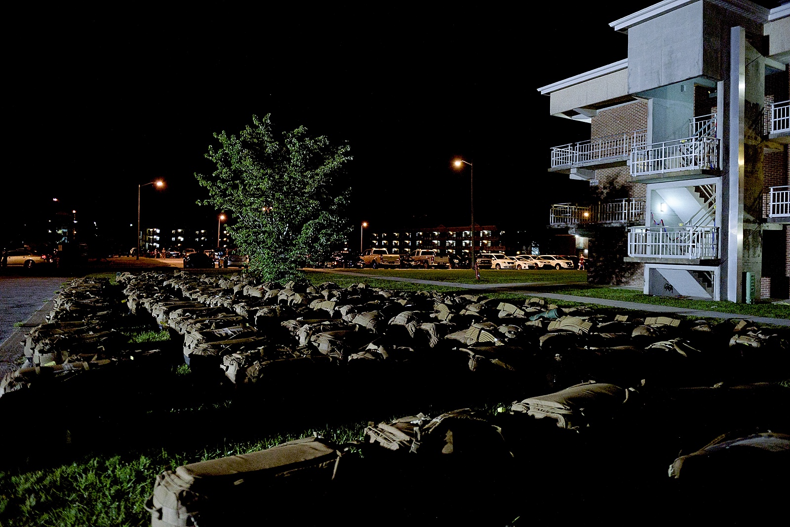 Nighttime Marine Corps homecoming photography at Camp Lejeune from North Carolina portrait photographer Lauren Nygard